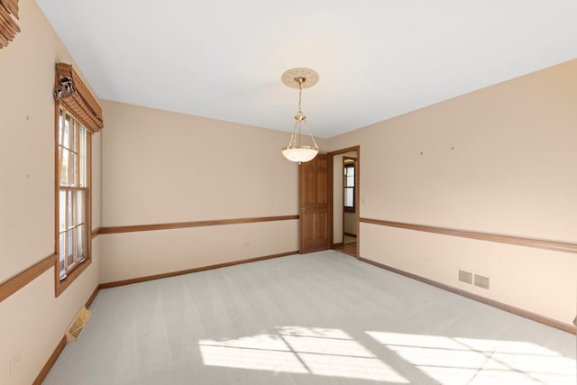 1624 Mirror Lake Dr, Naperville, IL 60563 - spare room featuring baseboards and light colored carpet