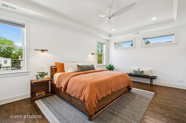 5263 N Laporte Ave, Chicago, IL 60630 - bedroom with a tray ceiling, baseboards, wood finished floors, recessed lighting, and a ceiling fan