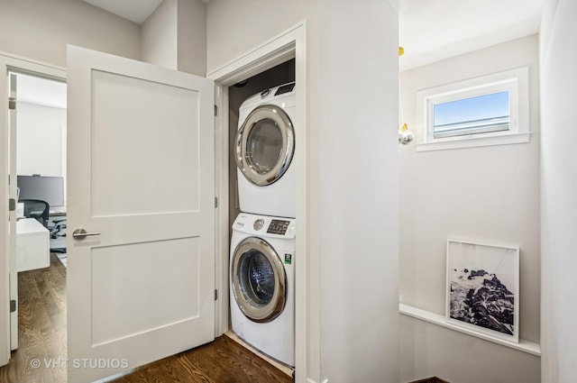 5263 N Laporte Ave, Chicago, IL 60630 - washroom with stacked washing machine and dryer and dark wood finished floors