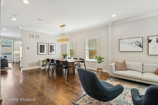 5263 N Laporte Ave, Chicago, IL 60630 - living area featuring a chandelier, baseboards, crown molding, wood finished floors, and recessed lighting
