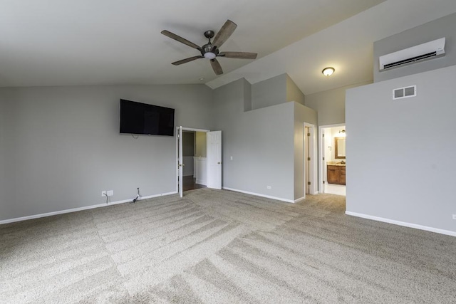 carpeted empty room featuring a wall mounted AC, a ceiling fan, baseboards, and high vaulted ceiling