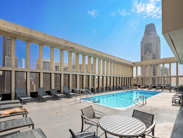 100 E Walton St Unit 18G, Chicago, IL 60611 - community pool with a patio and a view of city
