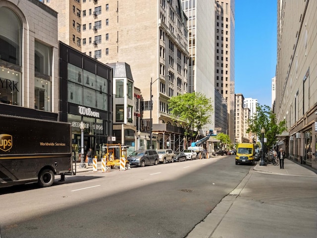 100 E Walton St Unit 18G, Chicago, IL 60611 - view of asphalt street featuring street lights, sidewalks, and a city view