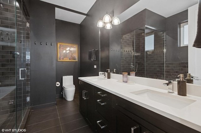 bathroom featuring toilet, tile patterned flooring, a shower stall, and double vanity
