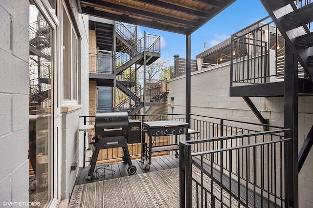 balcony featuring stairway