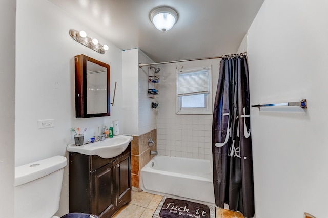 full bath with tile patterned floors, shower / bathtub combination with curtain, toilet, and vanity