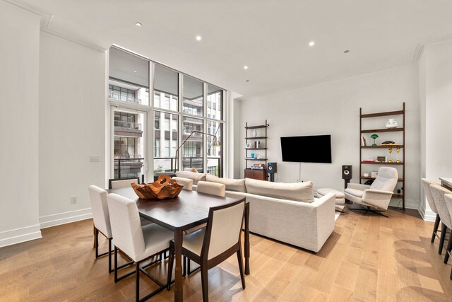 435 N Michigan Ave Unit 416, Chicago, IL 60611 - dining space featuring light wood-style floors, recessed lighting, baseboards, and ornamental molding