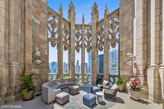 435 N Michigan Ave Unit 416, Chicago, IL 60611 - building lobby featuring a high ceiling and a view of skyline