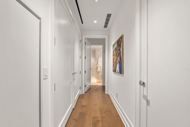 435 N Michigan Ave Unit 416, Chicago, IL 60611 - hallway with wood finished floors, recessed lighting, and baseboards