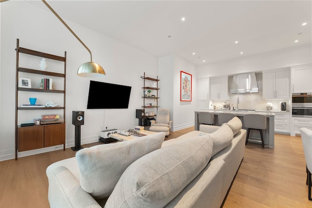 435 N Michigan Ave Unit 416, Chicago, IL 60611 - living area with light wood-style floors, recessed lighting, and baseboards