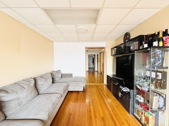 3328 S Oakley Ave, Chicago, IL 60608 - living room with a drop ceiling and light wood-style flooring
