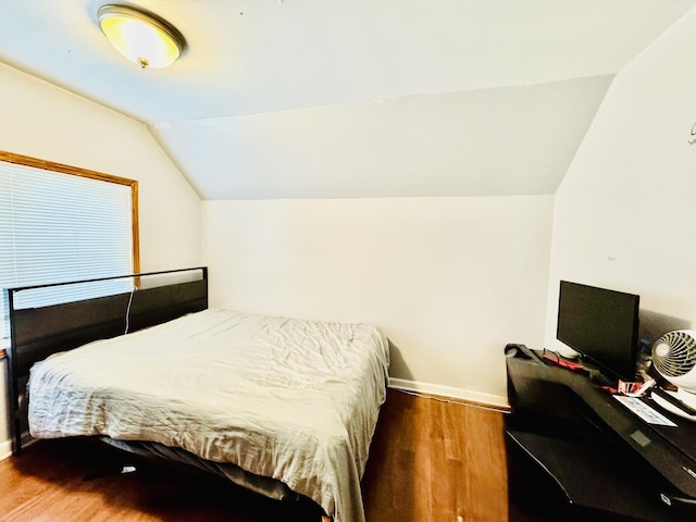 3328 S Oakley Ave, Chicago, IL 60608 - bedroom with baseboards, wood finished floors, and lofted ceiling