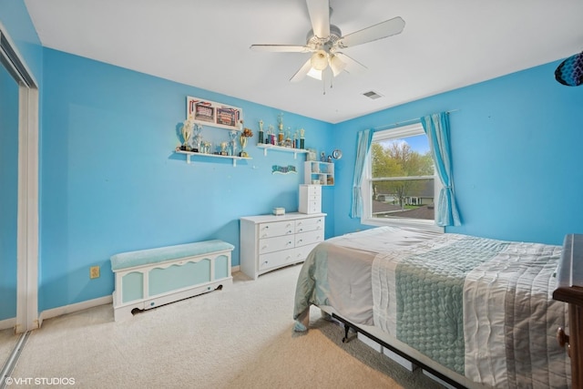 2404 Meadow Dr, Rolling Meadows, IL 60008 - bedroom with carpet floors, baseboards, and a ceiling fan
