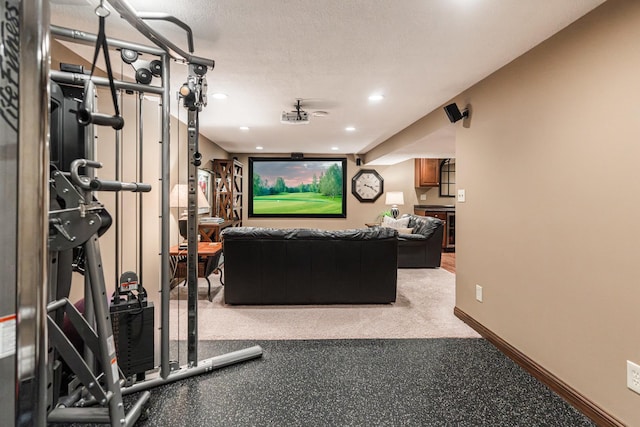 home theater room featuring recessed lighting and baseboards