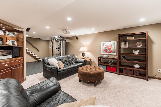 living area with light carpet, recessed lighting, stairway, and baseboards
