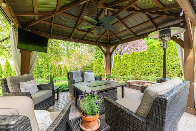 view of patio with an outdoor hangout area and a gazebo