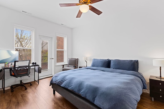6452 N Glenwood Ave Unit 3, Chicago, IL 60626 - bedroom with wood finished floors, access to exterior, and a ceiling fan