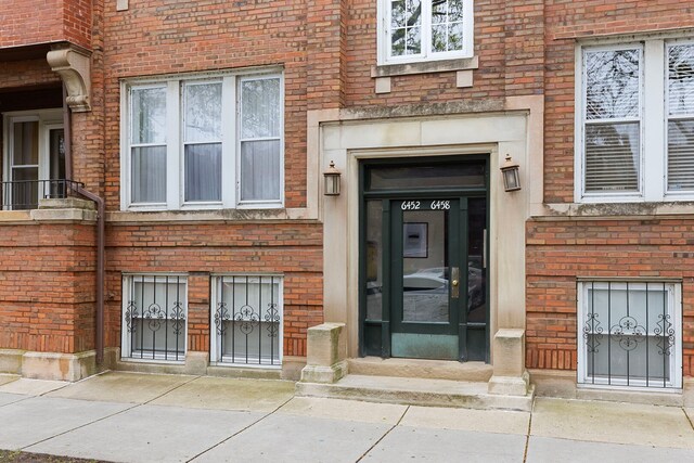 6452 N Glenwood Ave Unit 3, Chicago, IL 60626 - property entrance featuring brick siding