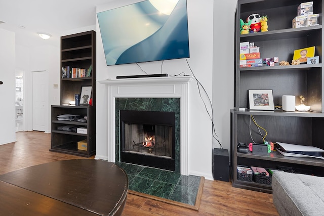 6452 N Glenwood Ave Unit 3, Chicago, IL 60626 - living area featuring a high end fireplace and wood finished floors