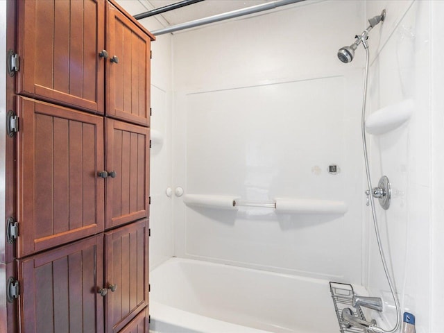 bathroom featuring washtub / shower combination