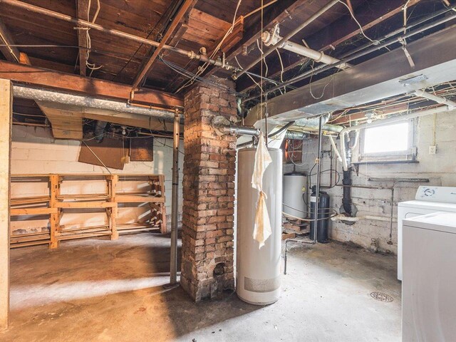 below grade area with water heater and washer / clothes dryer