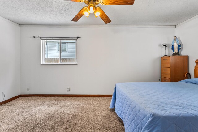 2503 Maplewood Dr, Champaign, IL 61821 - bedroom with carpet flooring, a textured ceiling, ceiling fan, and baseboards