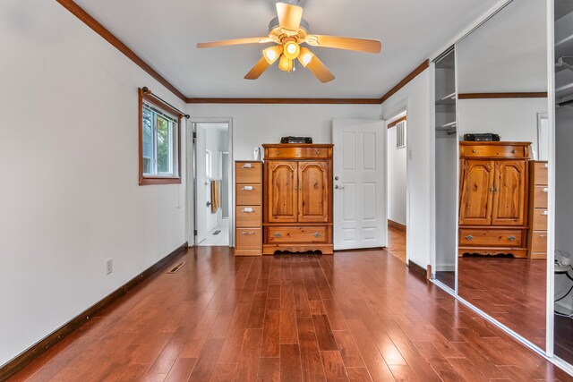 2503 Maplewood Dr, Champaign, IL 61821 - bedroom featuring ornamental molding, baseboards, dark wood-style flooring, and ceiling fan