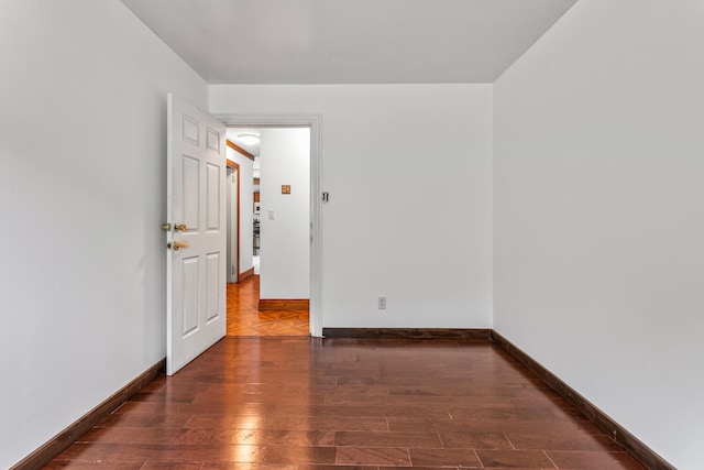 2503 Maplewood Dr, Champaign, IL 61821 - unfurnished room featuring wood finished floors and baseboards