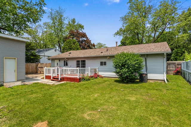 2503 Maplewood Dr, Champaign, IL 61821 - rear view of property featuring a deck and roof with shingles