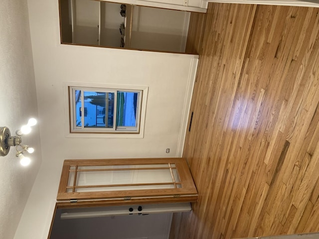 interior space featuring wooden walls