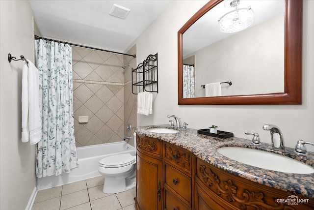1316 Carol Ln, Naperville, IL 60565 - full bath with tile patterned floors, toilet, double vanity, and shower / tub combo