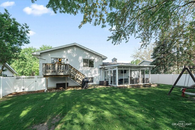 1316 Carol Ln, Naperville, IL 60565 - back of house with a sunroom, a gate, a wooden deck, and stairs