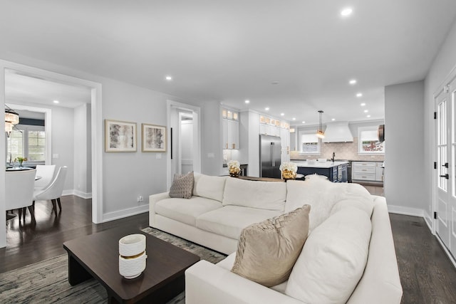 15 Reliance Ln, Lincolnshire, IL 60069 - living area with dark wood finished floors, baseboards, and recessed lighting