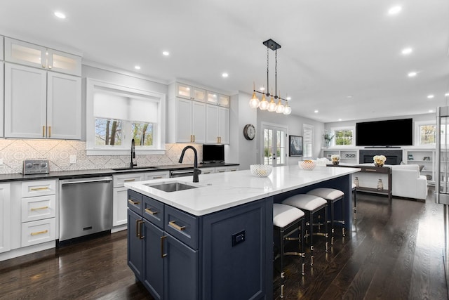 15 Reliance Ln, Lincolnshire, IL 60069 - kitchen with dishwasher, a sink, a center island with sink, open floor plan, and recessed lighting