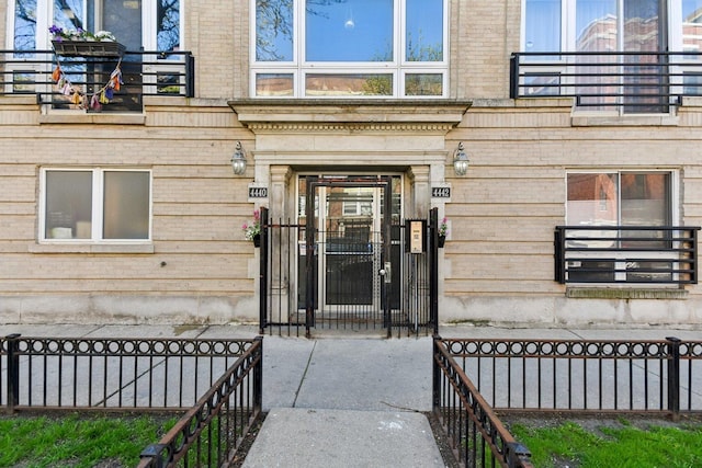 view of exterior entry with a gate