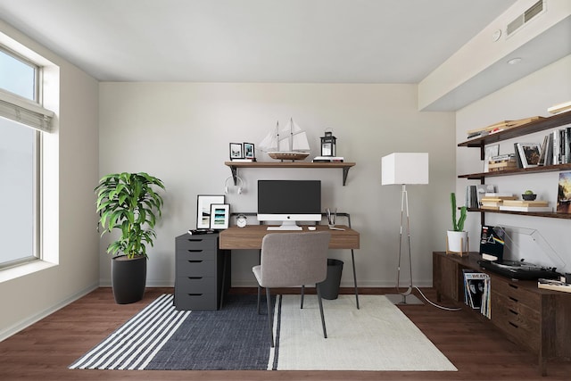 home office featuring visible vents, baseboards, and dark wood-style floors