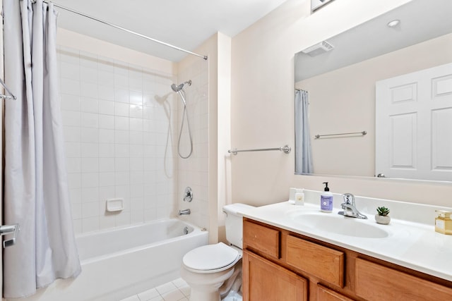 full bathroom featuring toilet, vanity, visible vents, tile patterned floors, and shower / bathtub combination with curtain