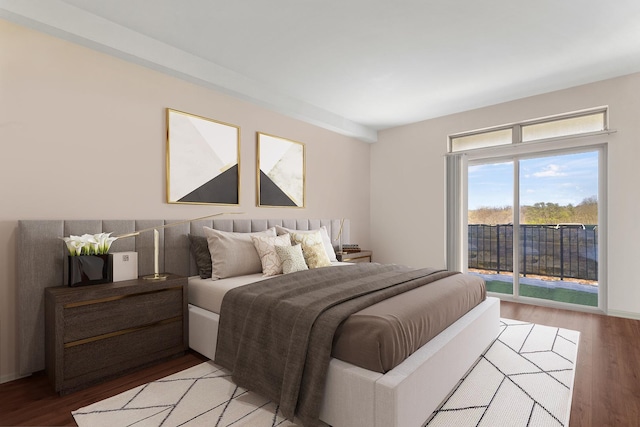 bedroom featuring light wood-type flooring and access to exterior