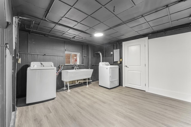 7732 W Sunset Dr, Elmwood Park, IL 60707 - laundry area featuring separate washer and dryer, laundry area, electric panel, and wood finished floors