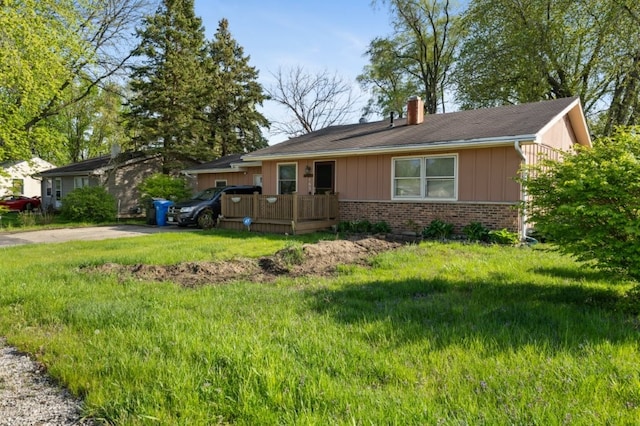 165 Ross Ave, South Elgin, IL 60177 - ranch-style house with brick siding, a chimney, a wooden deck, and board and batten siding