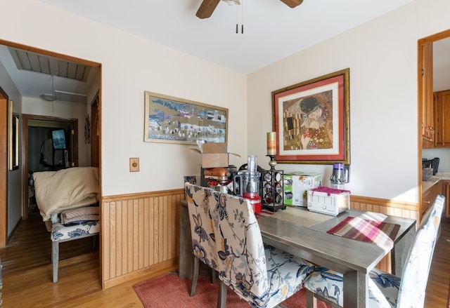 165 Ross Ave, South Elgin, IL 60177 - dining space with a wainscoted wall, light wood-style flooring, and ceiling fan