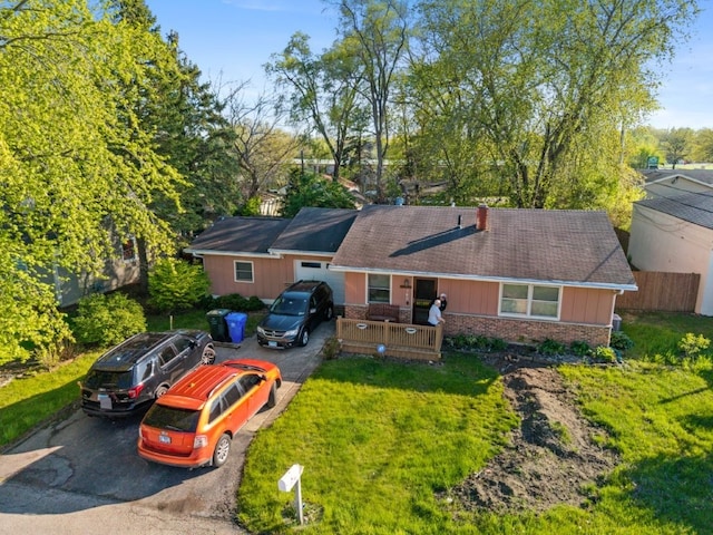 165 Ross Ave, South Elgin, IL 60177 - view of front of property with driveway, a front lawn, and brick siding