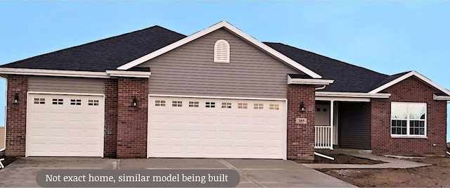 2955 Walbridge Creek Cir, Marseilles, IL 61341 - view of front of house featuring an attached garage, concrete driveway, and brick siding