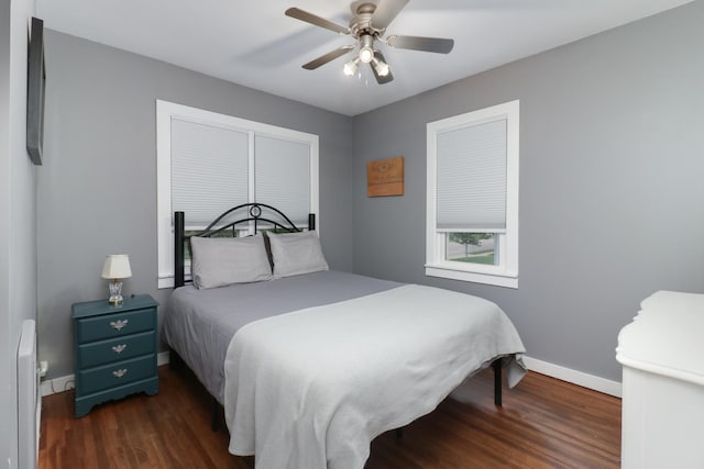 704 S Cottage Ave, Normal, IL 61761 - bedroom featuring dark wood-style floors, baseboards, and ceiling fan