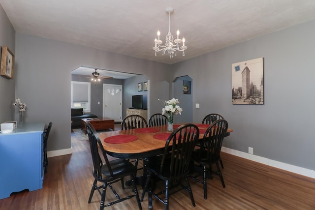 704 S Cottage Ave, Normal, IL 61761 - dining room featuring arched walkways, baseboards, wood finished floors, ceiling fan, and a chandelier
