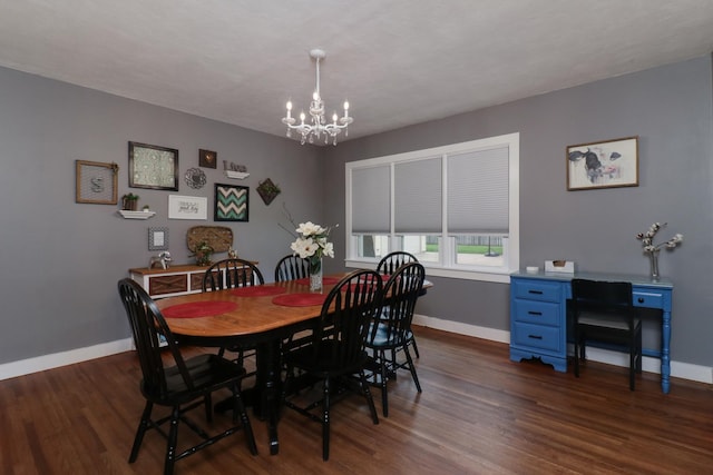 704 S Cottage Ave, Normal, IL 61761 - dining area with a chandelier, dark wood-style flooring, and baseboards