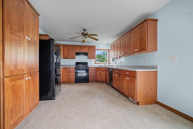 kitchen with black appliances, extractor fan, a ceiling fan, and brown cabinets