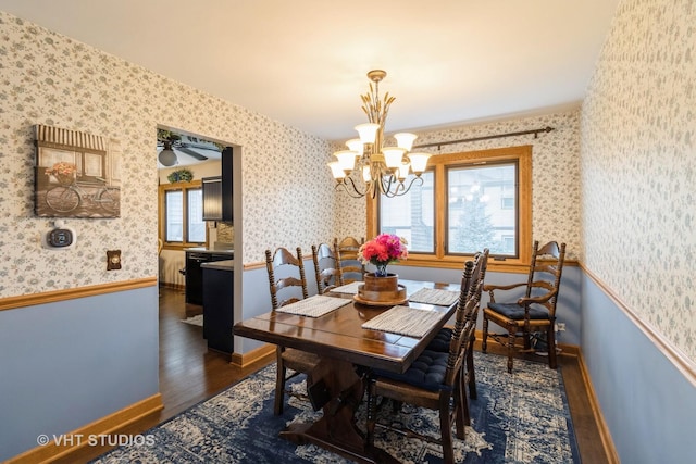 6 Sandalwood Ct, Streamwood, IL 60107 - dining space with wood finished floors, wallpapered walls, a chandelier, and baseboards