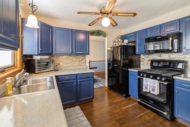 6 Sandalwood Ct, Streamwood, IL 60107 - kitchen featuring black appliances, blue cabinetry, a sink, a ceiling fan, and light countertops