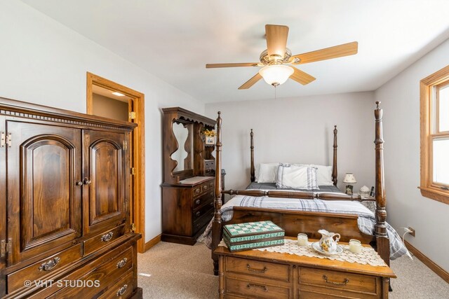 6 Sandalwood Ct, Streamwood, IL 60107 - bedroom with light colored carpet, baseboards, and a ceiling fan